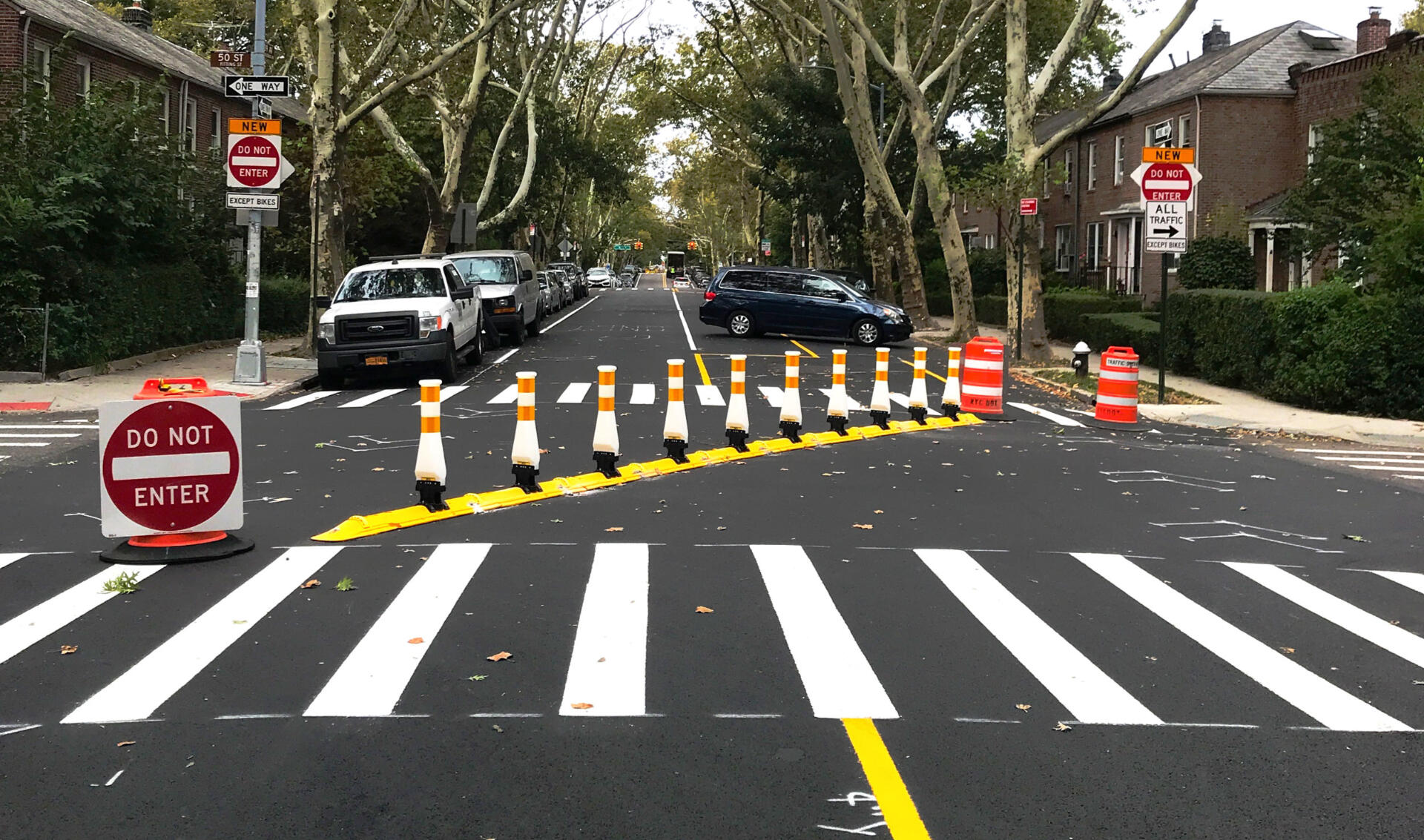 a barrier diverts traffic away from the bike boulevard